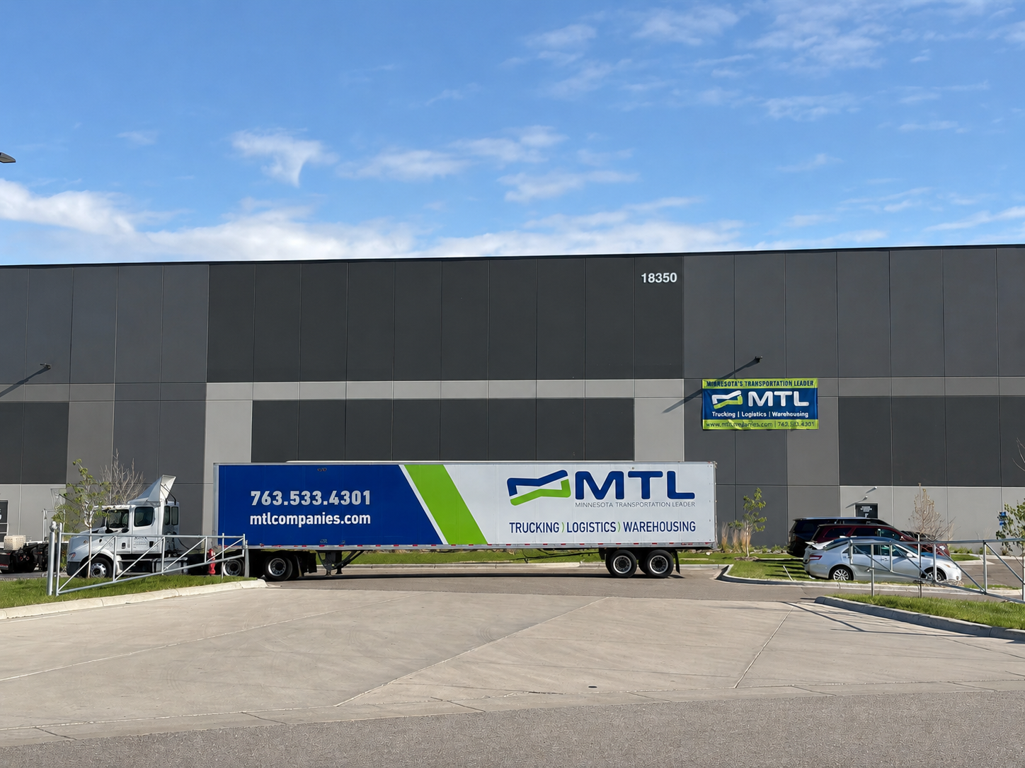 MTL Companies truck and branded trailer outside its warehouse
